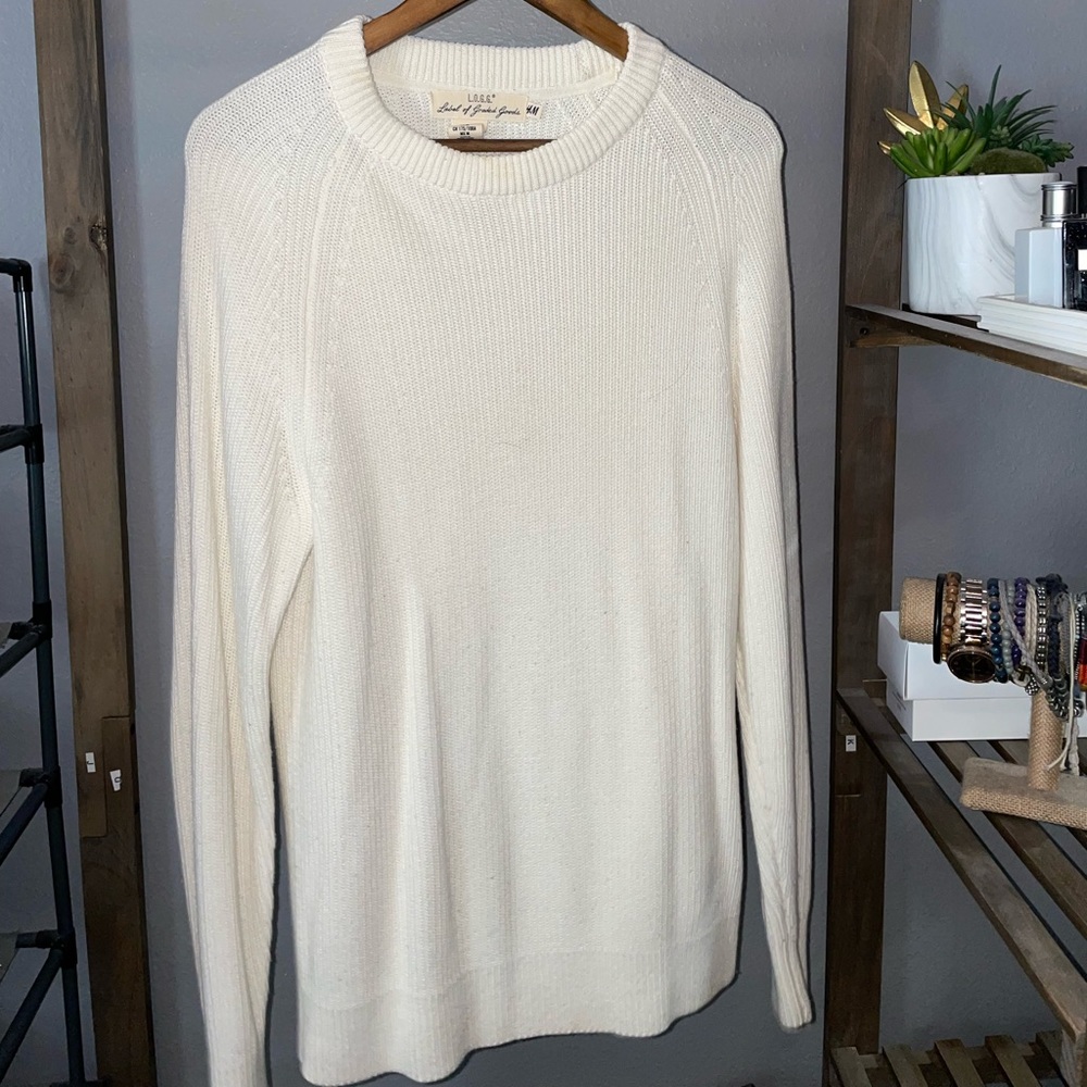 Cream colored men’s crew neck sweater
